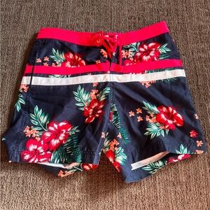 Penguin Board Shorts with Floral Swim Shorts with Red and Green Accents